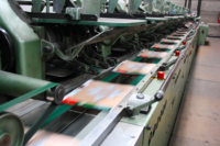 Insteekmachine reclamefolders